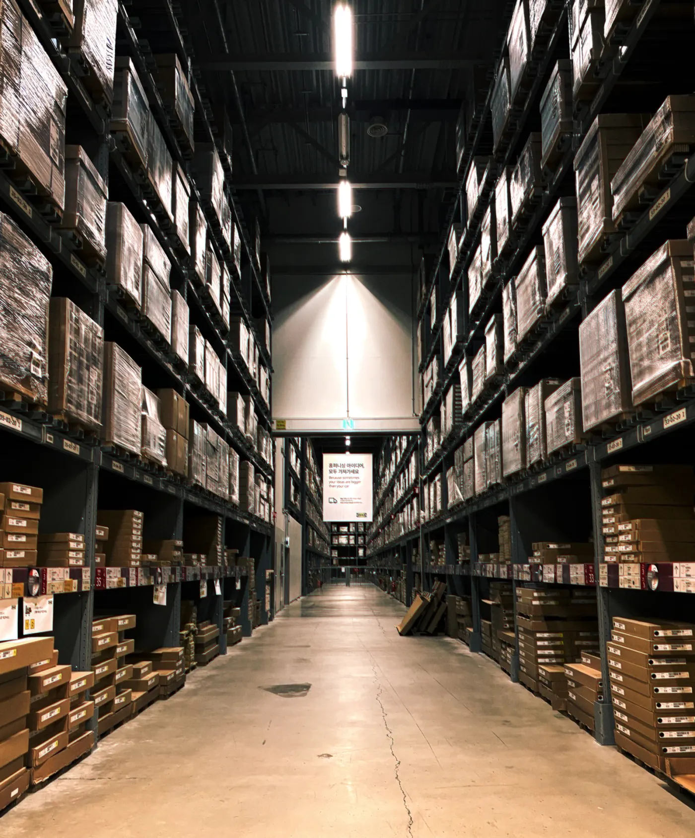 Stocked wholesale shelving, the kind of shop floor ShelfTech is built for