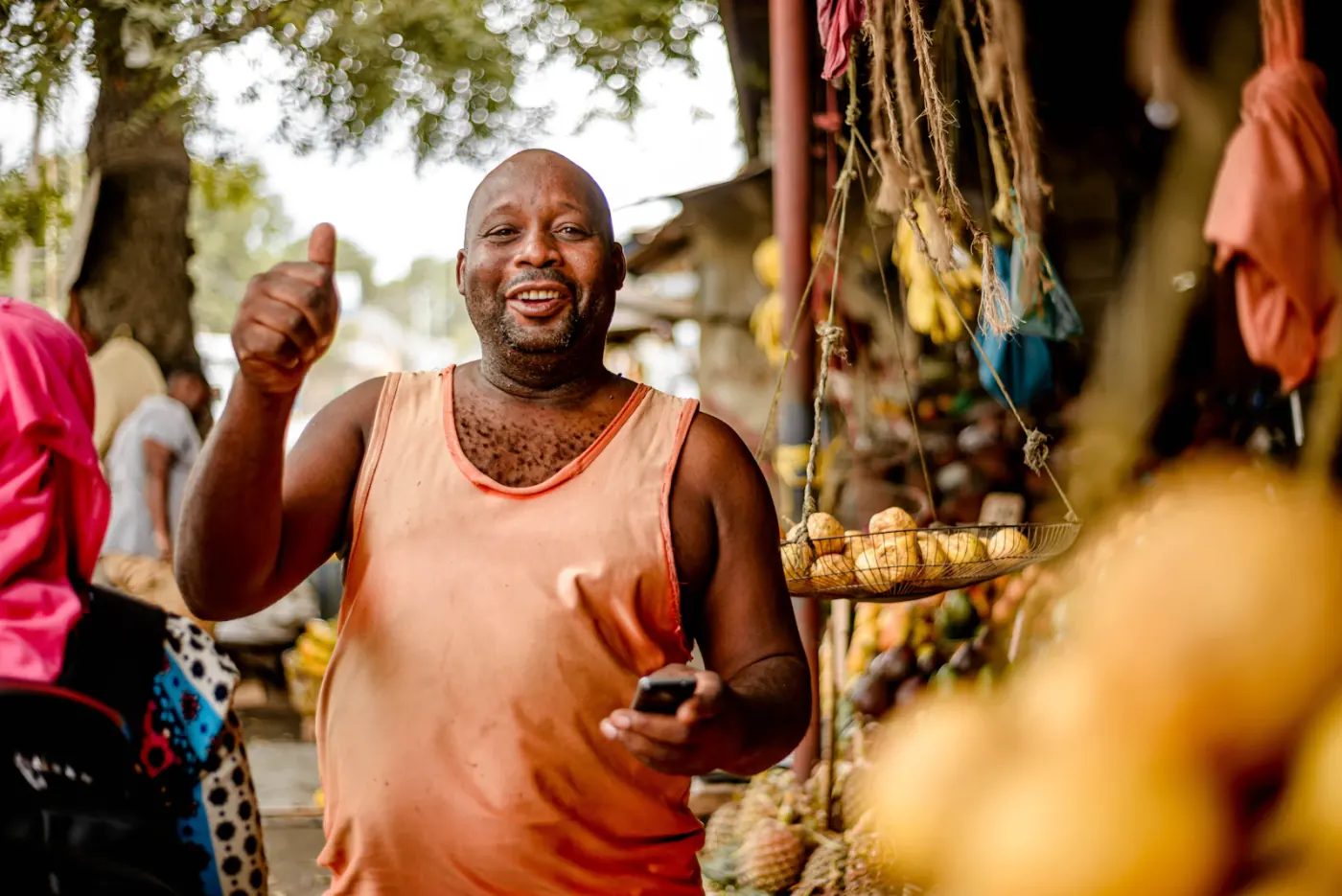 A shopkeeper behind the counter